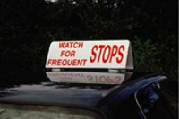 "Watch for Frequent Stops" Car Top Sign